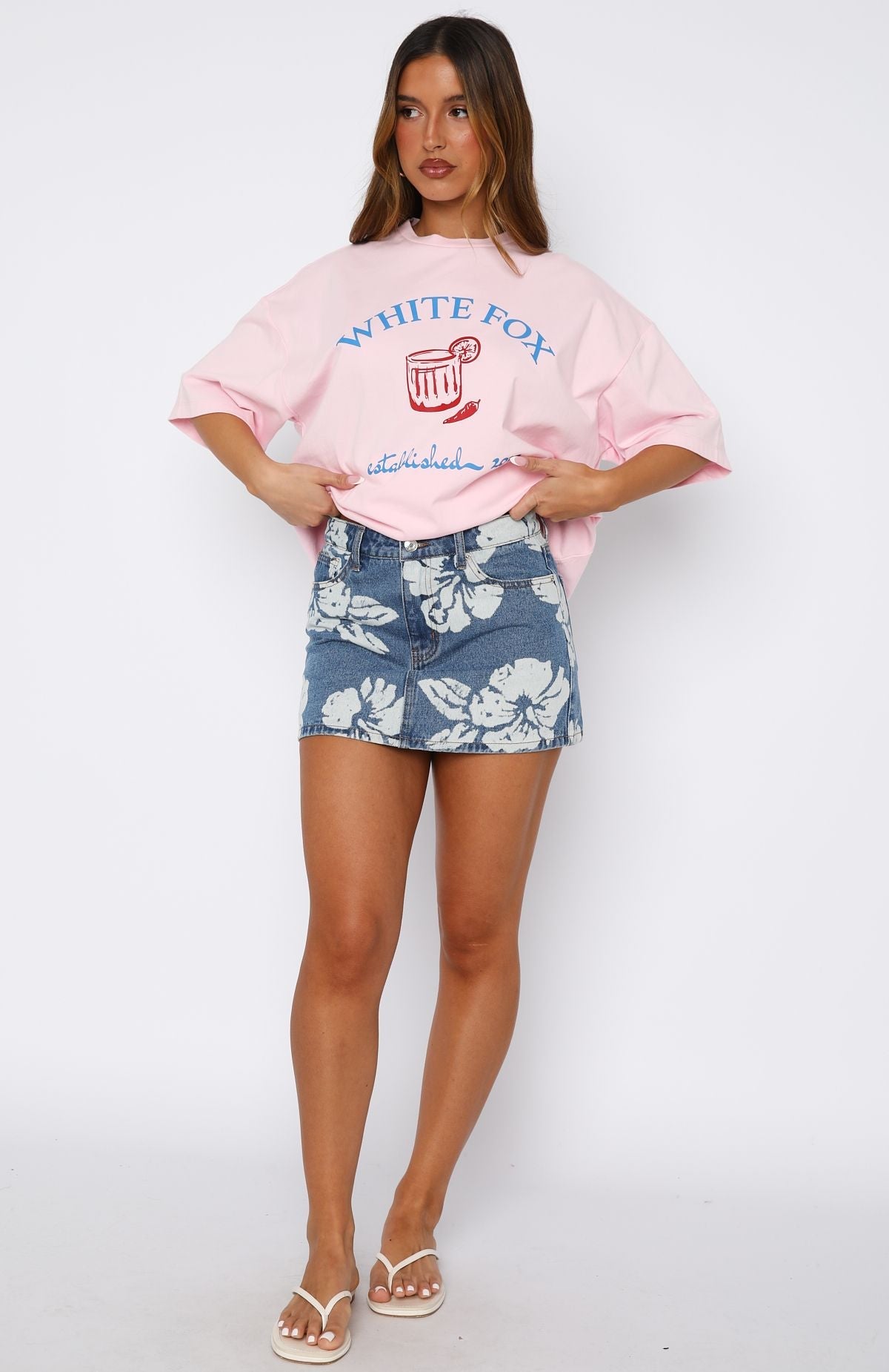 Won't Stop Searching Denim Mini Skirt Flower Print